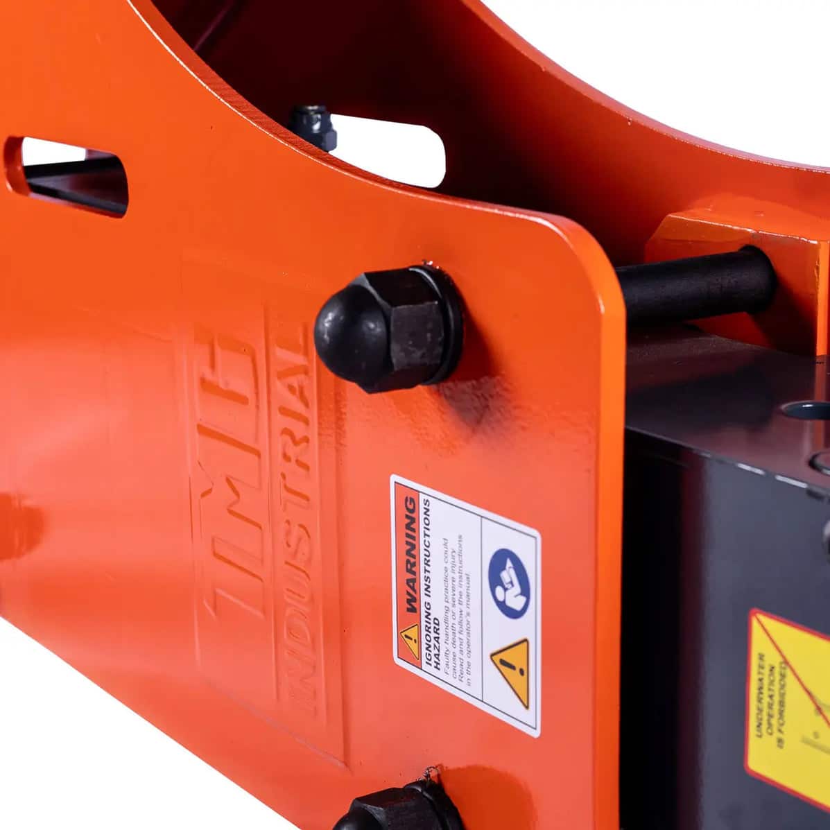 1d5be656-0d3a-59ae-a4a6-4f46a0102b12jpg - ExcavatorPin Orange industrial machine component with a black hex bolt and safety warning label on the frame.