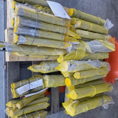 Hardened excavator bucket pins